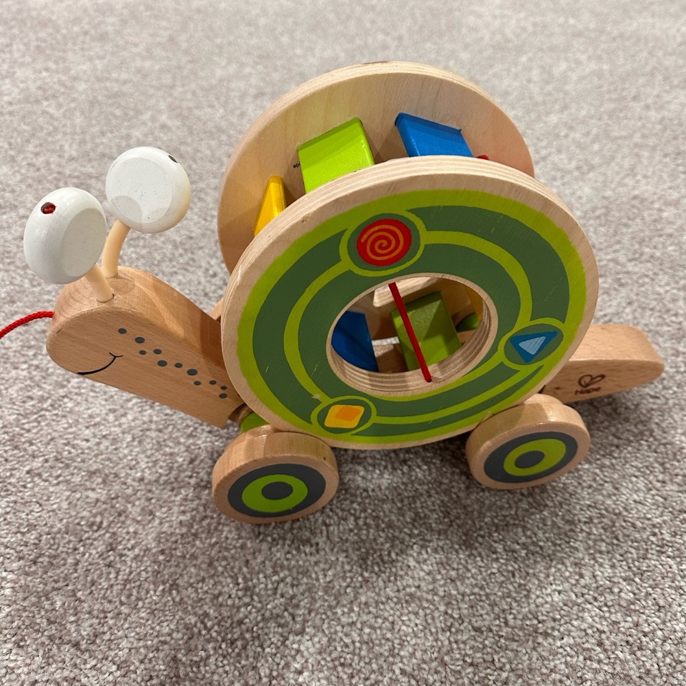 Hape wooden take along snail